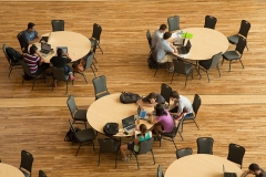 Students study in the Business Instructional Facility Atrium.